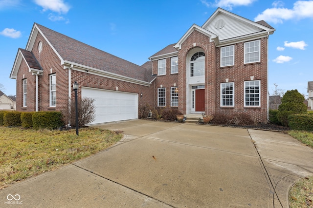 colonial home featuring a garage