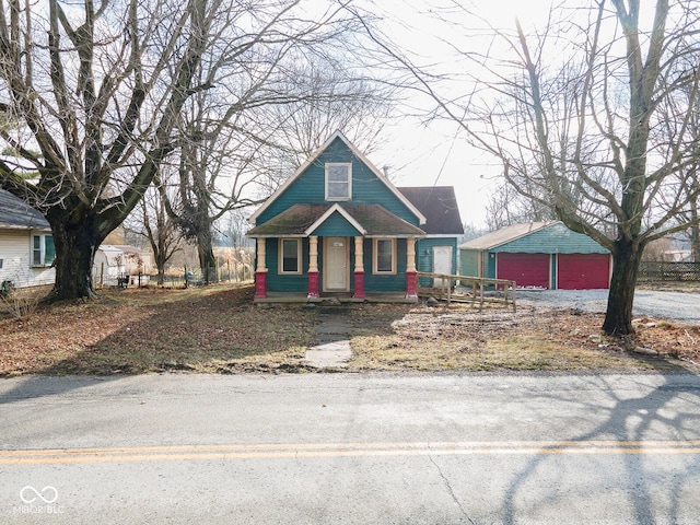 view of front of home featuring an outdoor structure and a garage