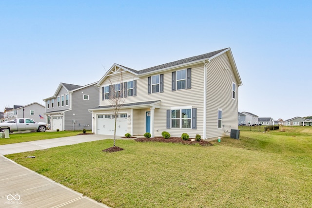 view of front of house featuring a garage, a front lawn, and central air condition unit