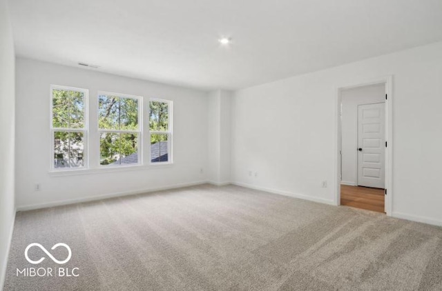 view of carpeted spare room