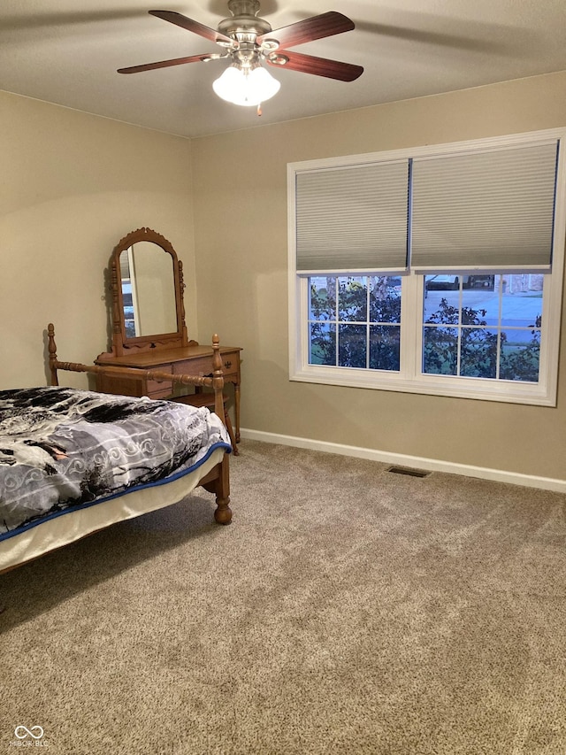 bedroom featuring carpet flooring and ceiling fan