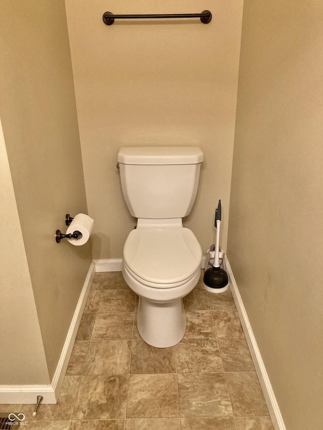 bathroom featuring toilet