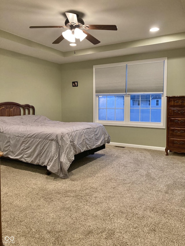 bedroom featuring ceiling fan and carpet floors