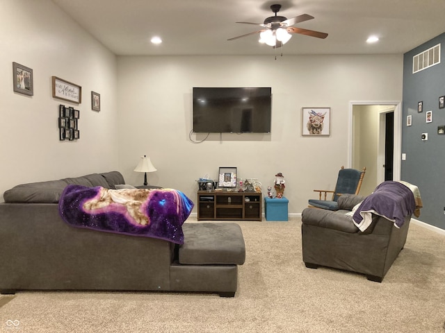 living room with carpet flooring and ceiling fan