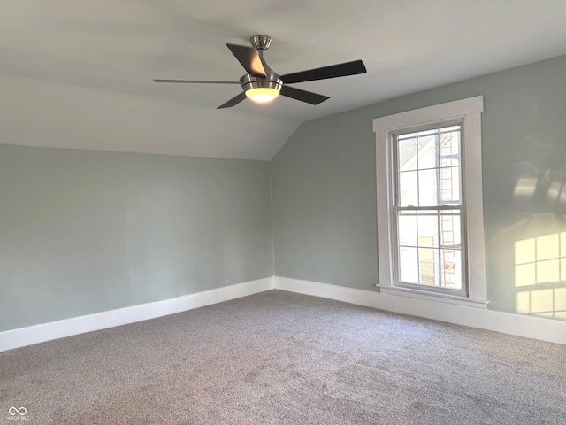 bonus room with carpet flooring, ceiling fan, and lofted ceiling