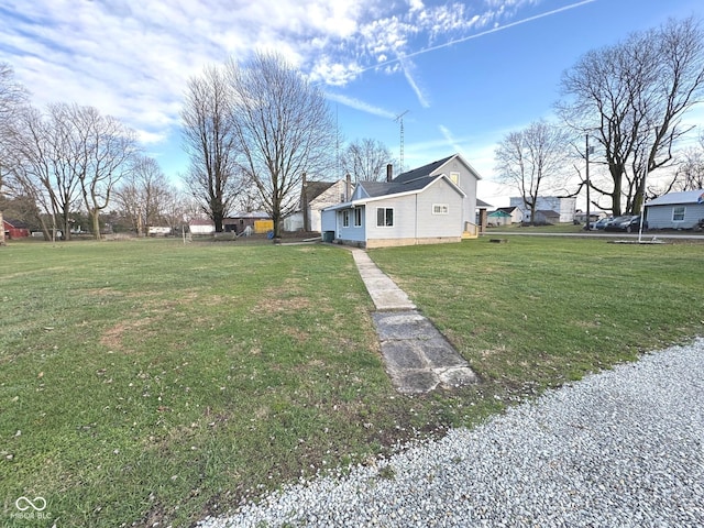 exterior space featuring a lawn