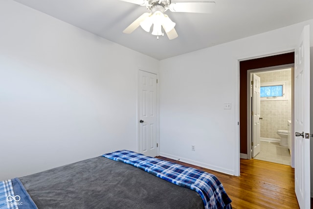 unfurnished bedroom featuring ceiling fan and wood-type flooring