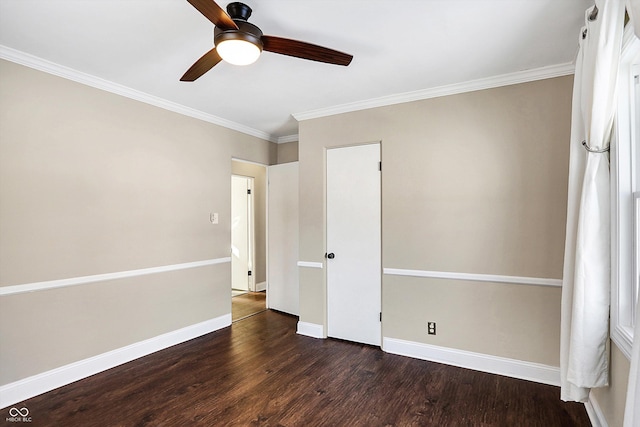 unfurnished bedroom featuring ceiling fan, crown molding, and dark hardwood / wood-style floors