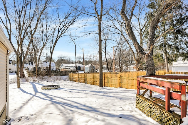 view of yard covered in snow