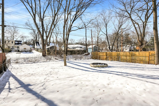 view of yard covered in snow