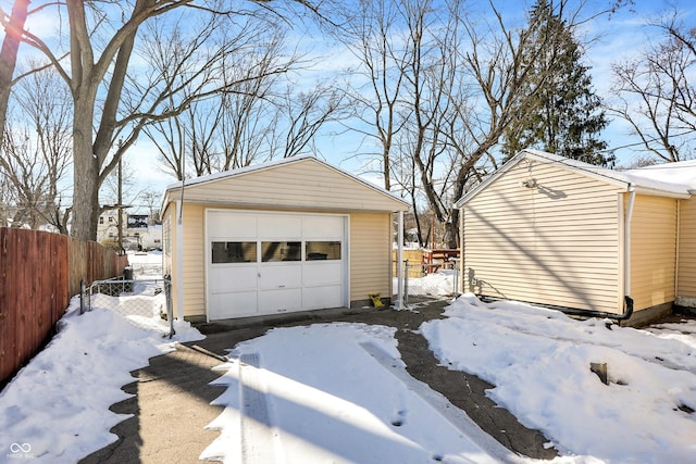 view of snow covered garage