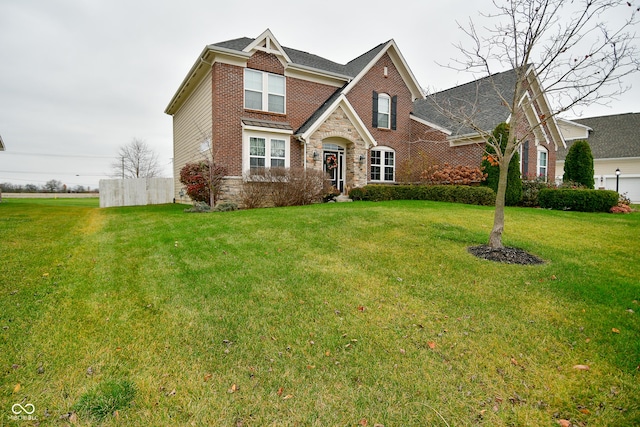 view of front of home featuring a front yard