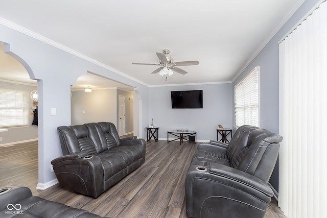 living room featuring crown molding, hardwood / wood-style floors, and ceiling fan