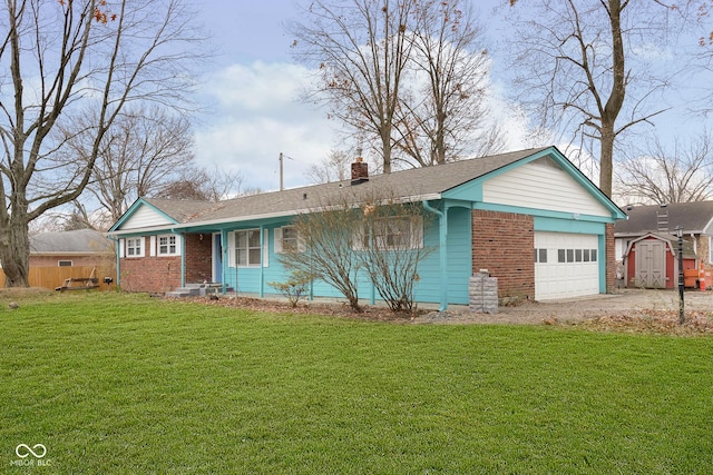 ranch-style home with a storage unit, a garage, and a front yard