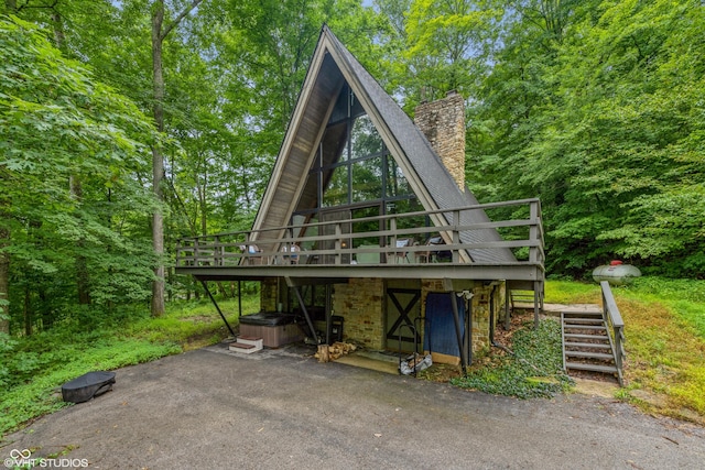 view of outdoor structure with a hot tub