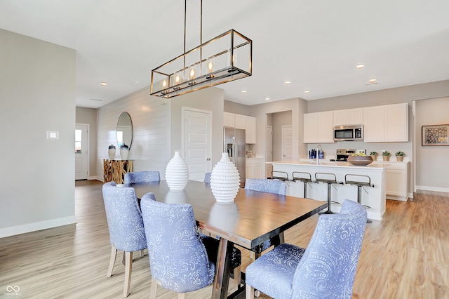 dining room featuring light hardwood / wood-style flooring