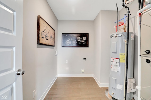 utility room with water heater