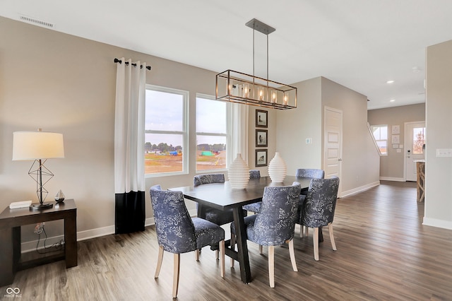 dining area featuring hardwood / wood-style floors