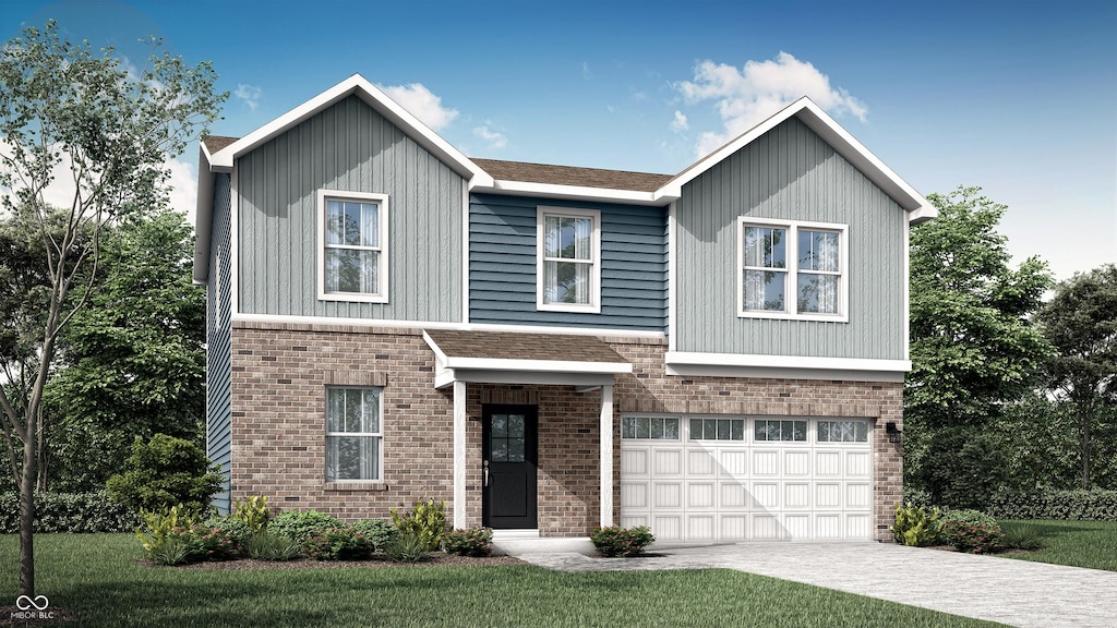 view of front of home featuring a garage and a front lawn