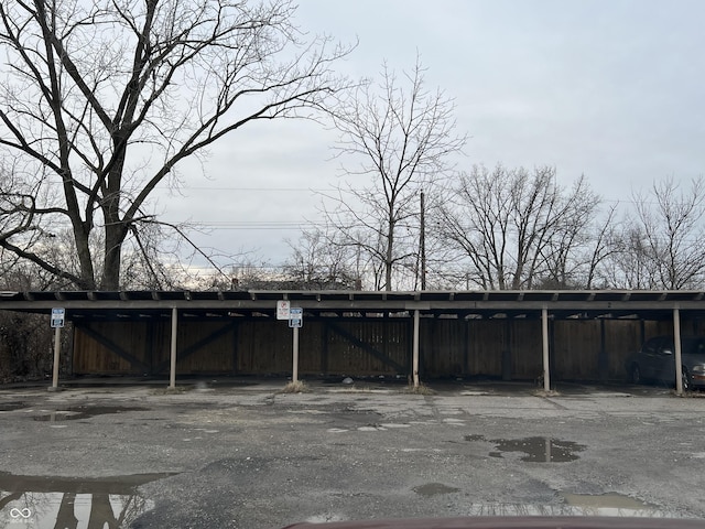 exterior space with a carport