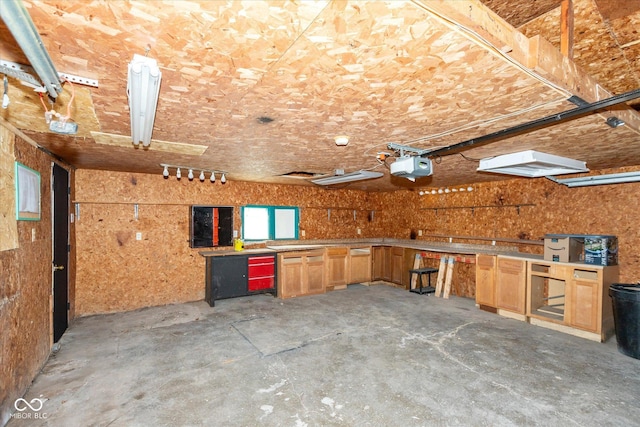 3060 S Shortridge Rd, Indianapolis, IN 46239 - garage with a workshop area and a garage door opener