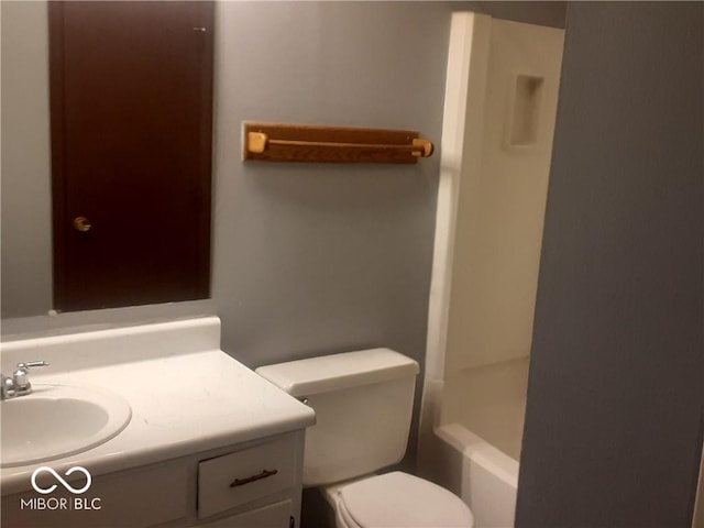 full bathroom featuring plus walk in shower, vanity, and toilet