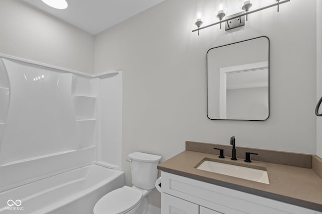 full bathroom with vanity, shower / washtub combination, and toilet