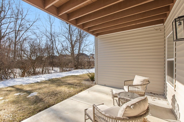 view of snow covered patio