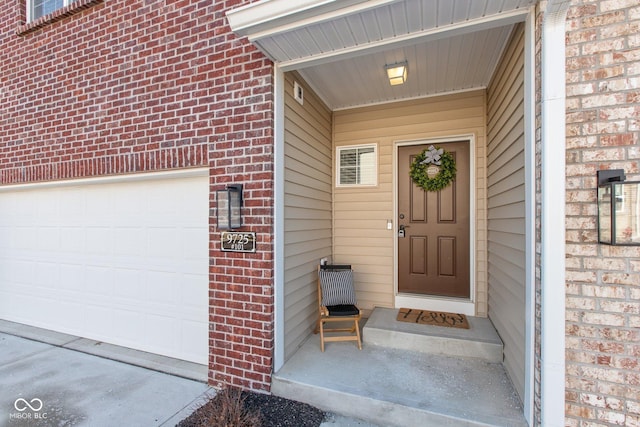 entrance to property featuring a garage