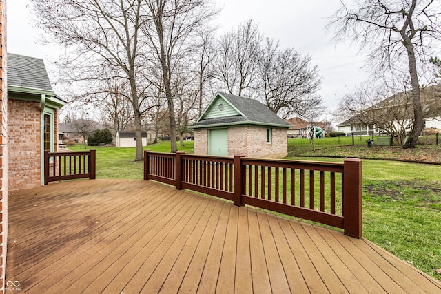 wooden deck with a yard and a storage shed