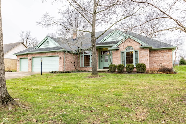 ranch-style house with a garage and a front lawn