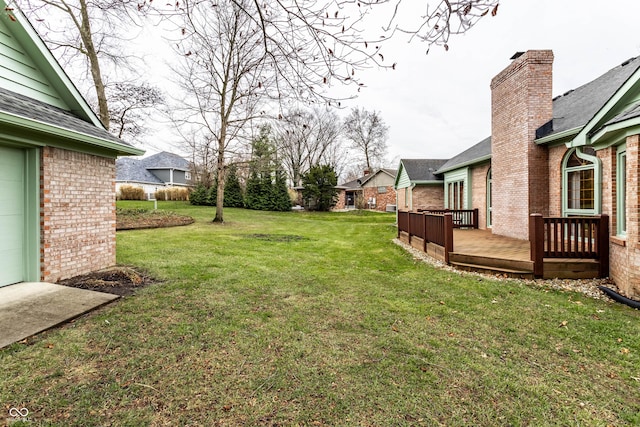 view of yard with a deck