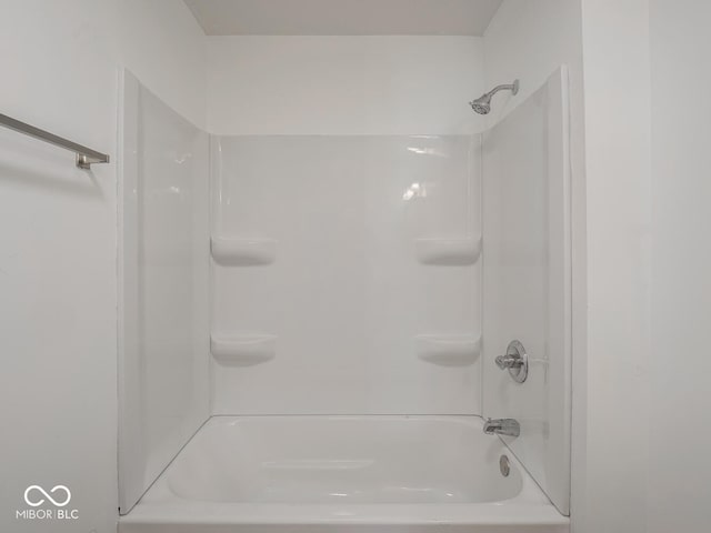 bathroom with shower / bathtub combination