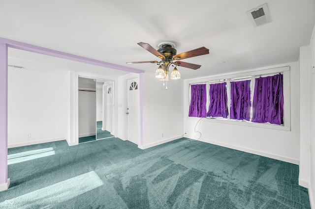100 N Jefferson St, Nashville, IN 47448 - carpeted empty room with a ceiling fan and baseboards