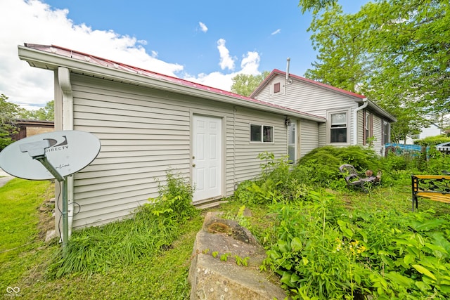 100 N Jefferson St, Nashville, IN 47448 - rear view of house featuring a metal roof