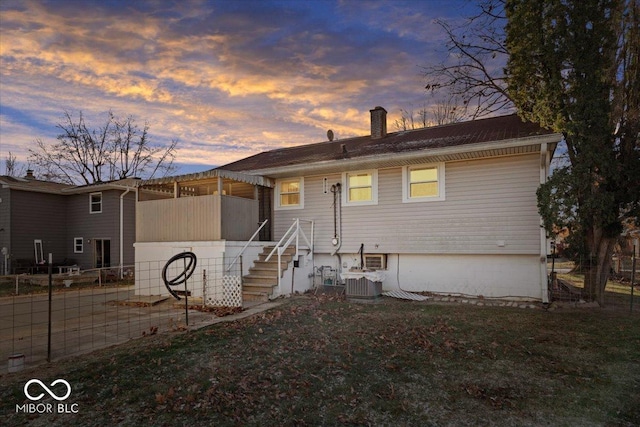 view of front of house with cooling unit