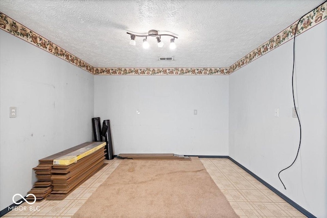 basement with a textured ceiling