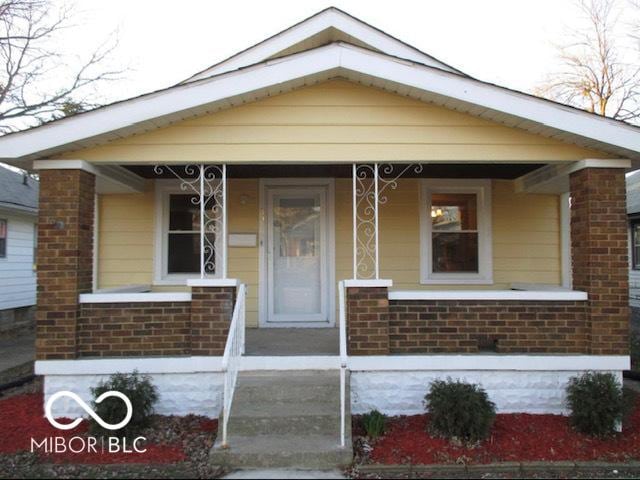 view of front of home featuring covered porch