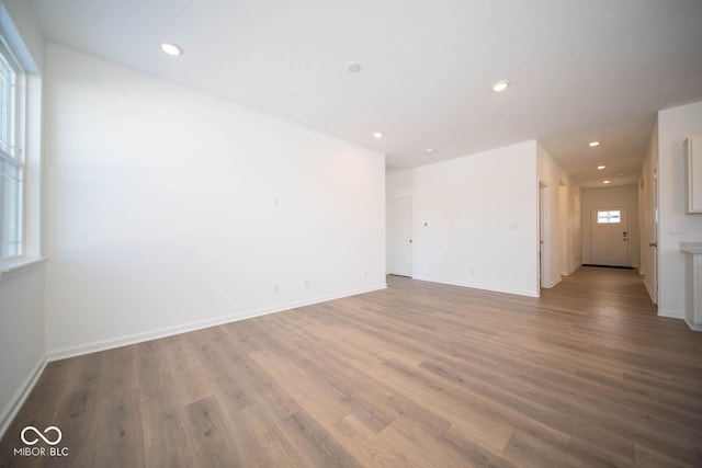 unfurnished room featuring light wood-type flooring