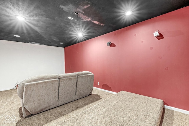 home theater room featuring carpet floors, baseboards, and recessed lighting