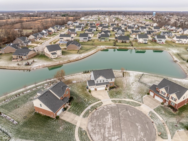 drone / aerial view with a water view