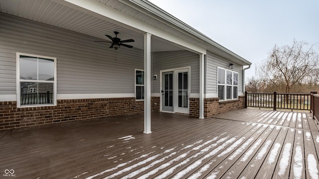 wooden terrace featuring ceiling fan