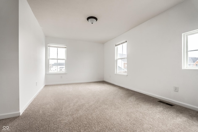 spare room with carpet