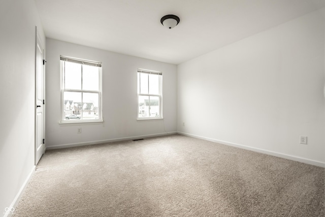 view of carpeted spare room