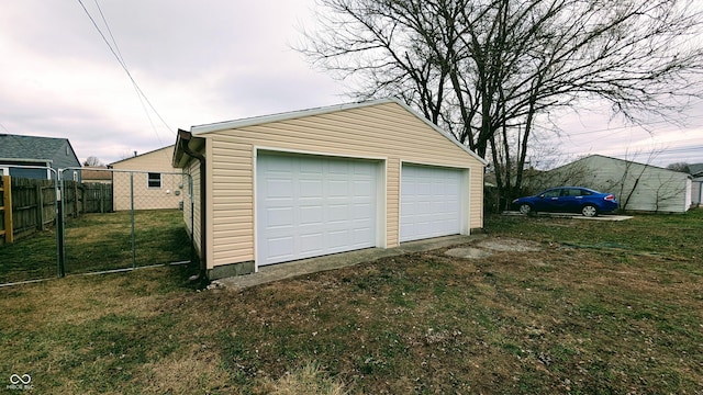 garage with a lawn