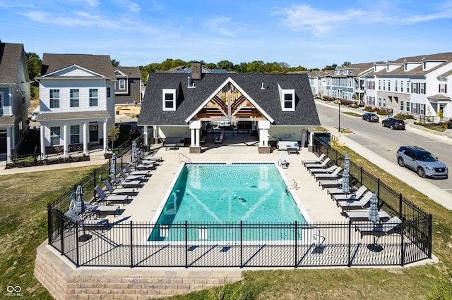 view of swimming pool with a patio area