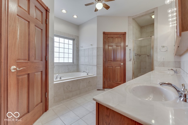 bathroom with tile patterned floors, vanity, ceiling fan, and plus walk in shower