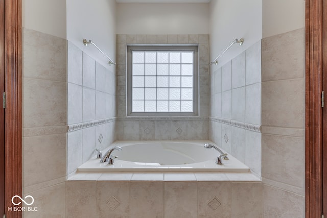 bathroom featuring a relaxing tiled tub