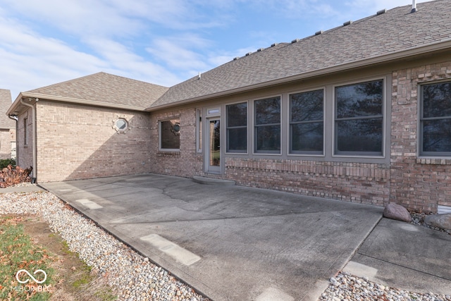 rear view of house featuring a patio area