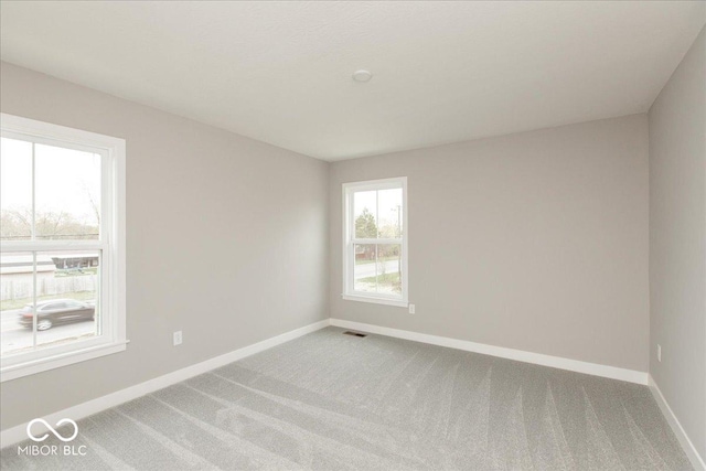 6973 Oakdale Ln, Avon, IN 46123 - spare room with carpet flooring, baseboards, and visible vents